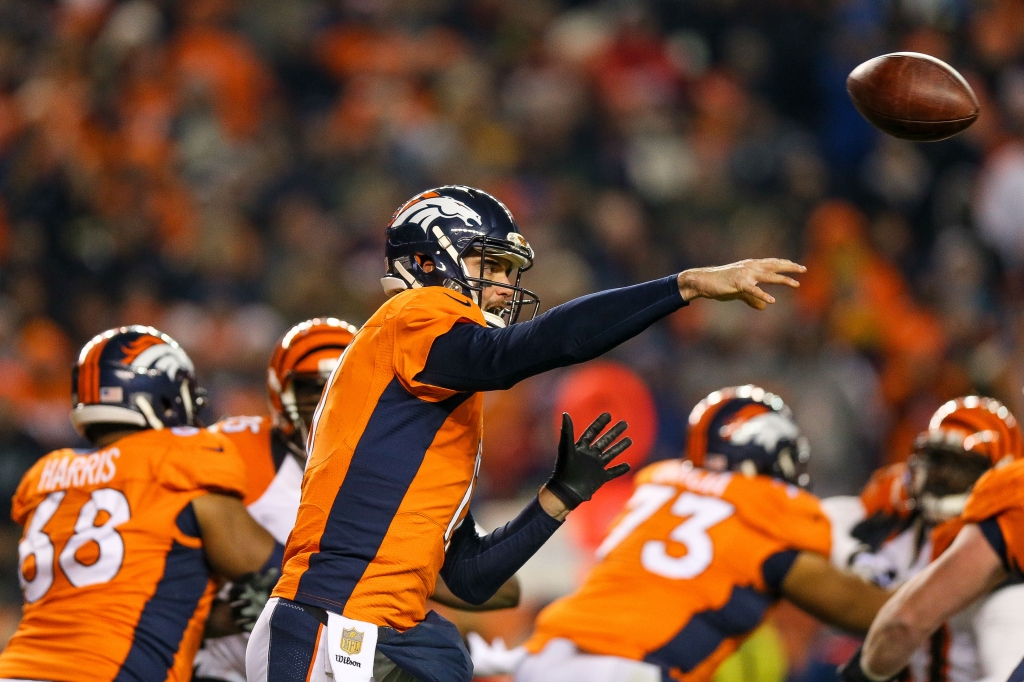 Quarterback Brock Osweiler #17 of the Denver Broncos passes against the Cincinnati Bengals during a game at Sports Authority Field at Mile High