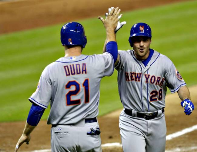 Lucas Duda greets Daniel Murphy after Murphy cracked a three-run homer to right-center