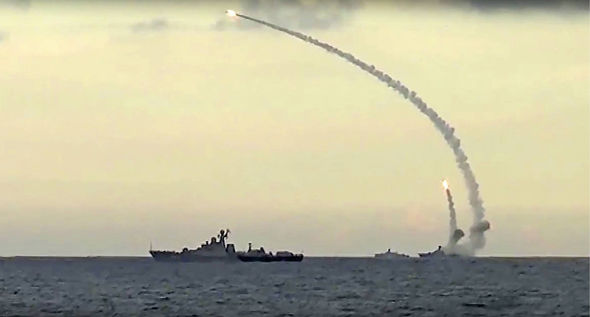 Russian navy ships launch cruise missiles at targets in Syria from the Caspian Sea