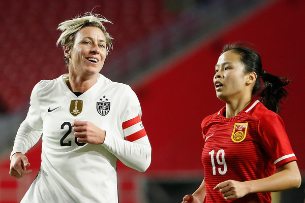 Coach Ryan Congratulates Former Player Abby Wambach