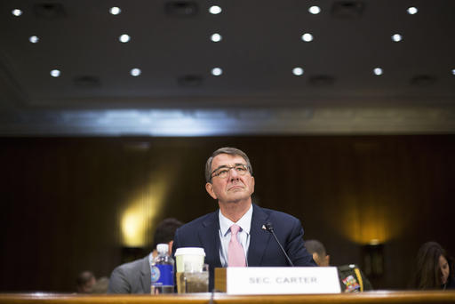 Defense Secretary Ash Carter arrives on Capitol Hill in Washington D.C. Dec. 9 2015 to testify before the Senate Armed Service Committee hearing on the Islamic State