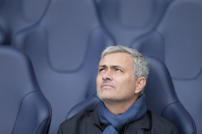 Chelsea Manager Jose Mourinho looks across the pitch before the English Premier League soccer match between Tottenham Hotspur and Chelsea at White Hart Lane in London. Mourinho has left Chelsea with the clu