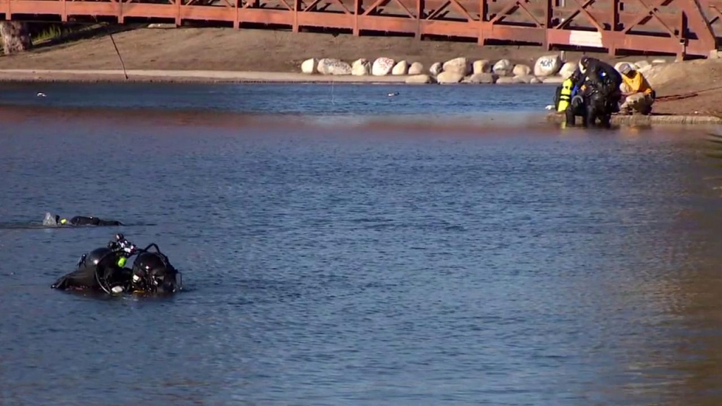 An FBI dive team scours a San Bernardino lake to find any evidence linked to the Dec. 2 terror attack