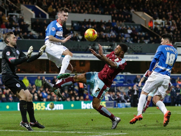 Andre Gray tries to find a way through