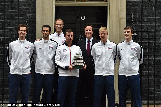 Great Britain's triumphant Davis Cup team Andy Murray, James Ward Dom Inglot Leon Smith Kyle Edmond and Jamie Murray pose with David Cameron outside 10 Downing Street