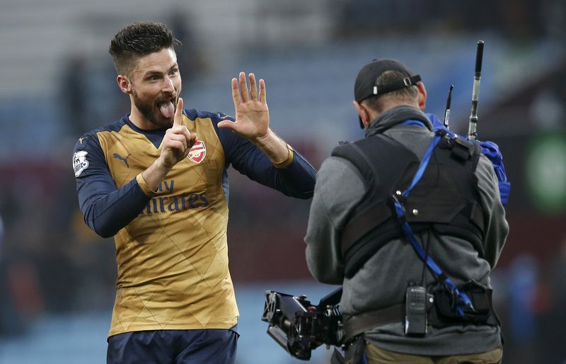 Arsenal's Olivier Giroud celebrates at the end of the Barclays Premier League match against Aston Villa at Villa Park. – Reuters pic