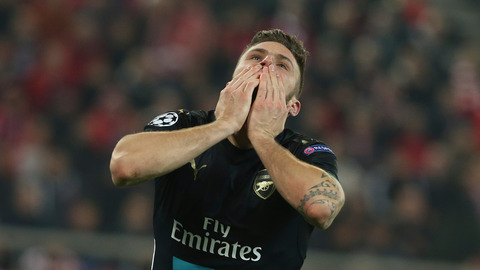 Arsenal's Olivier Giroud celebrates after scoring during a Champions League Group F soccer match between Olympiakos and Arsenal