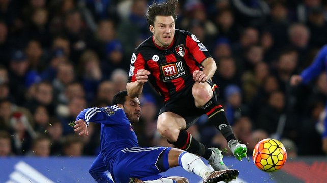 Harry Arter is tackled by Chelsea's Pedro