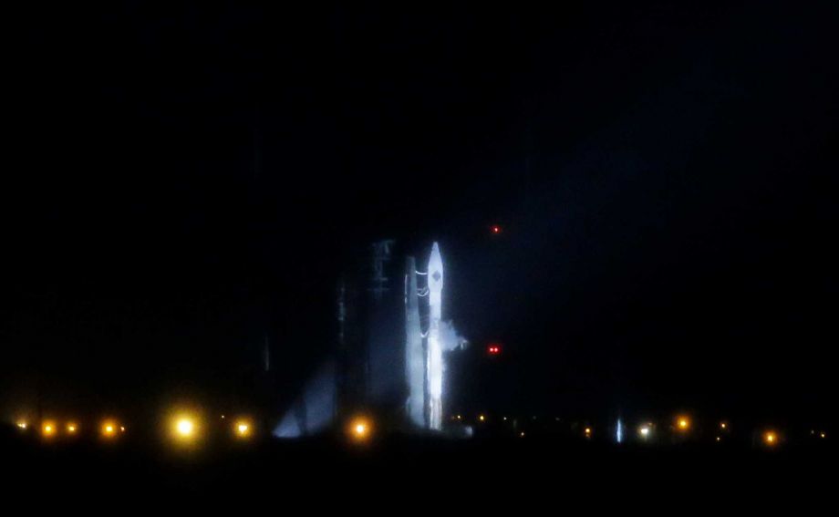 A United Launch Alliance Atlas V rocket stands ready shortly before a launch attempt was scrubbed due to poor weather conditions on launch complex 41at the Cape Canaveral Air Force Station Thursday Dec. 3 2015 in Cape Canaveral Fla. Another launch