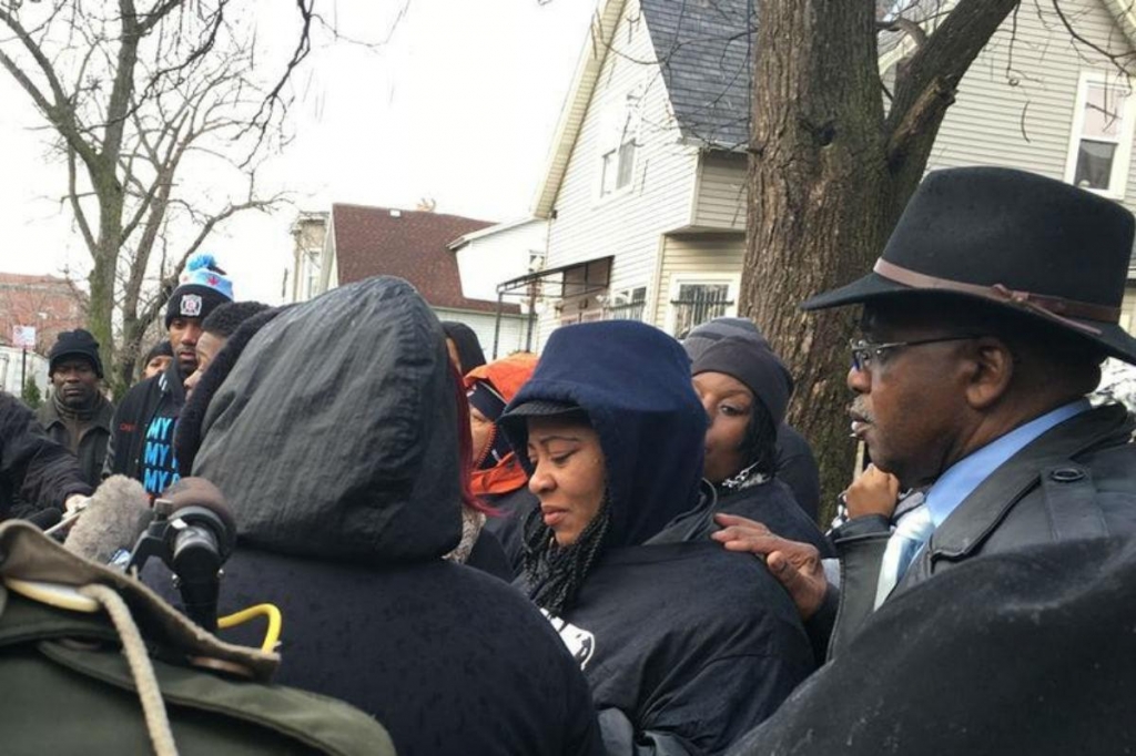 Janet Cooksey mother of Quintonio Legrier  is consoled by relatives and friends after speaking to the media in Chicago Illinois