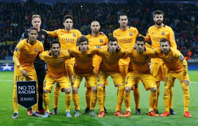 Barcelona's players pose before their Champions League group E soccer match at the Borisov Arena stadium outside Minsk Belarus