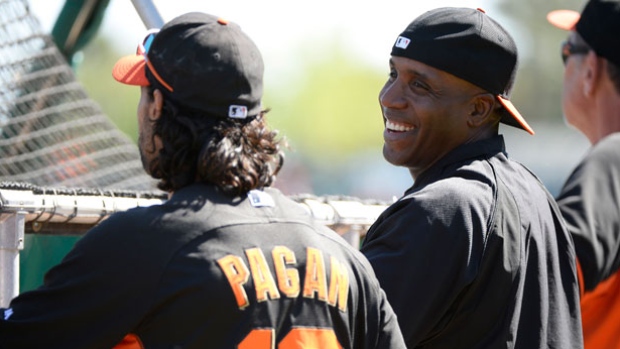 San Francisco Giants former outfielder Barry Bonds right would join Don Mattingly's staff if hired as a hitting coach by the Miami Marlins