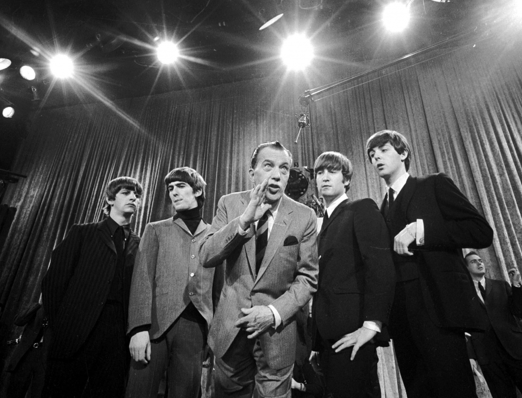 Ed Sullivan center stands with The Beatles from left Ringo Starr George Harrison John Lennon and Paul McCartney during a rehearsal for the British group's first American appearance on'The Ed Sullivan Sh