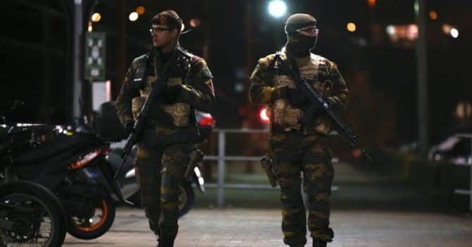 Belgium soldiers patrol near a railway station in Vervier