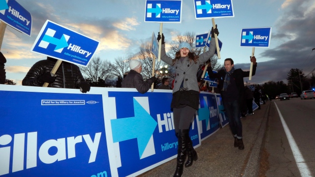 Hillary Clinton supporters rally on Saturday before the former secretary of state takes on Vermont Senator Bernie Sanders and former Maryland governor Martin O'Malley at the Democratic presidential primary debate at Saint Anselm College in Manchester