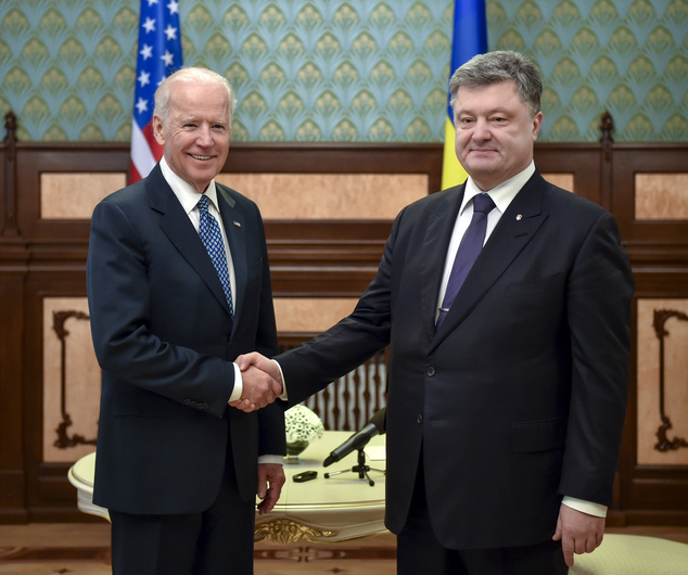 Ukrainian President Petro Poroshenko right shakes hands with U.S. Vice President Joe Biden during a meeting in Kiev Ukraine Monday Dec. 7 2015. (AP P