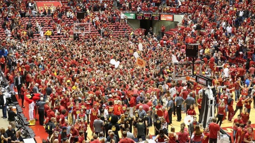 Dec 10 2015 Ames IA USA Iowa State Cyclones students rush the court after beating the Iowa Hawkeyes at James H. Hilton Coliseum. The Cyclones beat the Hawkeyes 83-82. Mandatory Credit Reese Strickland-USA TODAY Sports