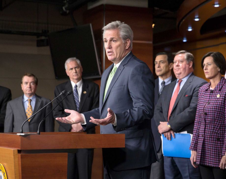 House Majority Leader Kevin Mc Carthy answers questions on Friday about negotiations to finalize a $1.1 trillion spending bill and a sprawling tax package