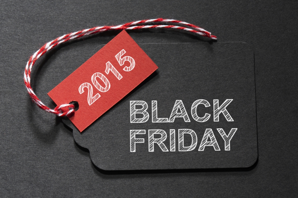 Black Friday 2015 text on a black tag with a red and white twine