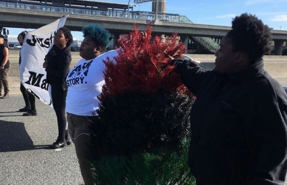 Black Lives Matter protesters shut down a Minneapolis interstate Monday evening a day after the police shooting of Jamar Clark who later died