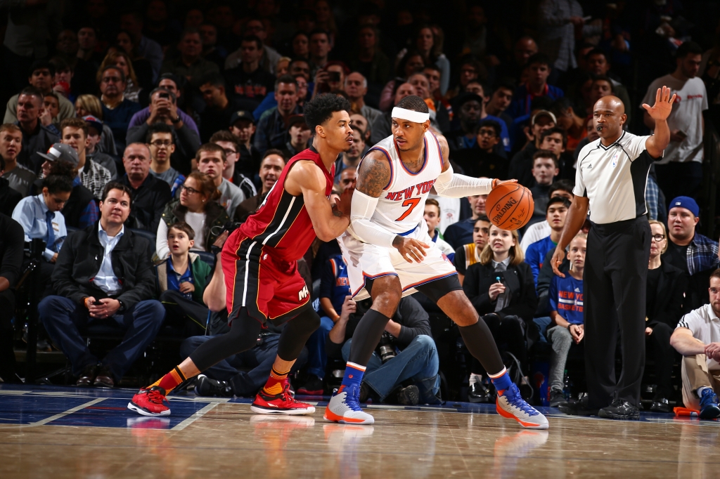 NEW YORK NY- NOVEMBER 27 Carmelo Anthony #7 of the New York Knicks drives to the basket while guarded by Gerald Green #14 of the Miami Heat