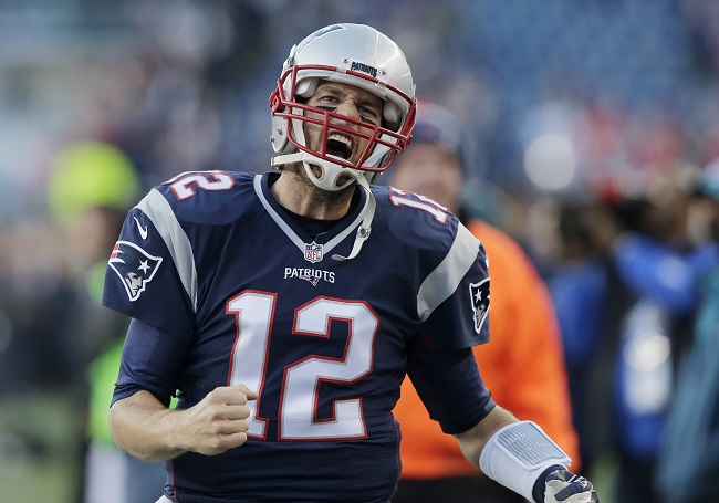 New England Patriots quarterback Tom Brady takes the field for warm ups before an NFL football game against the Philadelphia Eagles Sunday Dec. 6 2015 in Foxborough Mass