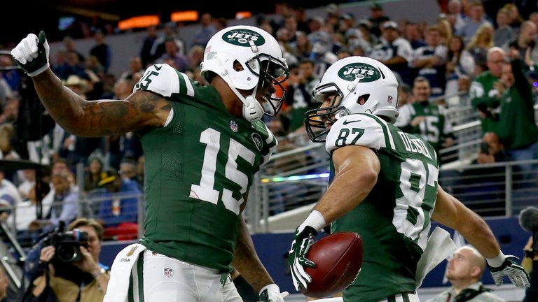 Brandon Marshall #15 and Eric Decker #87 of the New York Jets celebrate after Decker's touchdown