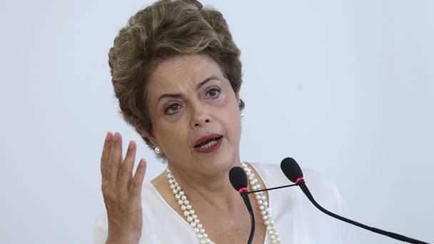 Brazil's President Dilma Rousseff speaks during a ceremony where she signed a presidential decree giving tax breaks to companies that join the'Green Free Trade Zone at Planalto presidential palace in Brasilia Brazil Friday Dec. 18 2015. To be