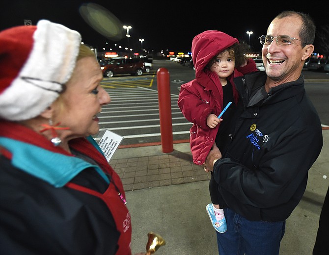 Jack Buckenmeyer of La Salle was all smiles with his daughter Abigail 2 after being greeted by Jessie Milligan outside Walmart in Monroe