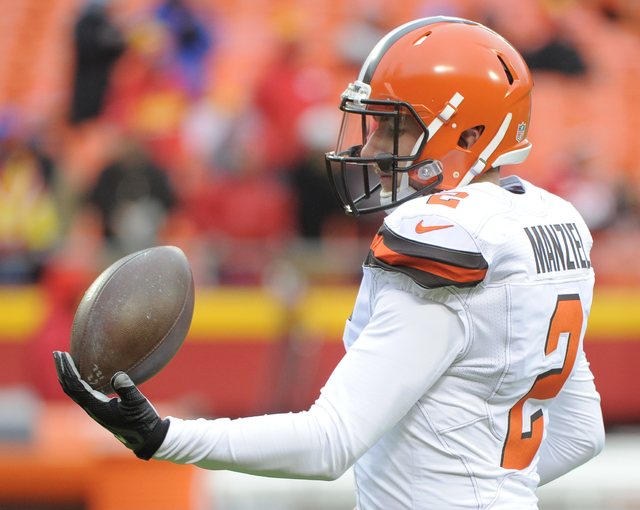 ASSOCIATED PRESS           Cleveland Browns quarterback Johnny Manziel balances a football before an NFL football game against the Kansas City Chiefs in Kansas City Mo. Sunday