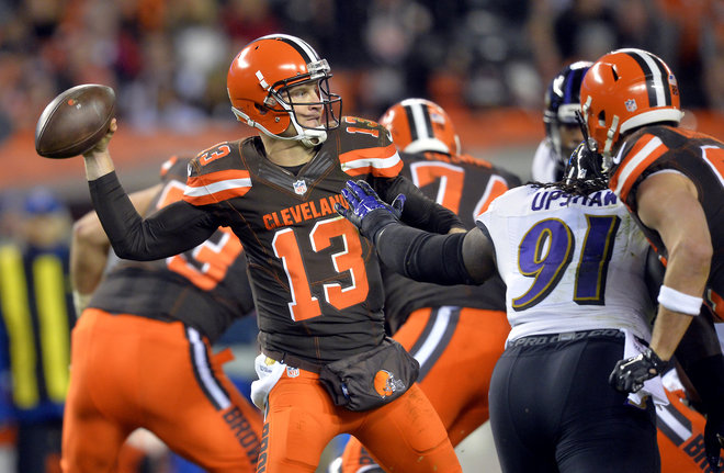 Cleveland Browns quarterback Josh Mc Cown throws in the first half of an NFL football game against the Baltimore Ravens Monday Nov. 30 2015 in Cleveland