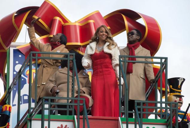 Mariah Carey waves from a float during the Macy's Thanksgiving Day Parade on Thursday