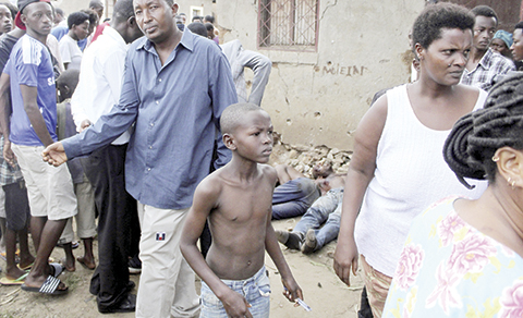 Gunfire, explosions shut down Burundi's capital, amid tensions over president's tenure