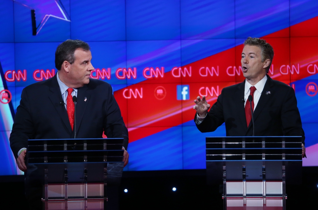 LAS VEGAS NV- DECEMBER 15 Republican presidential candidate U.S. Sen. Rand Paul  speaks as New Jersey Gov. Chris Christie listens during the CNN Republican presidential debate