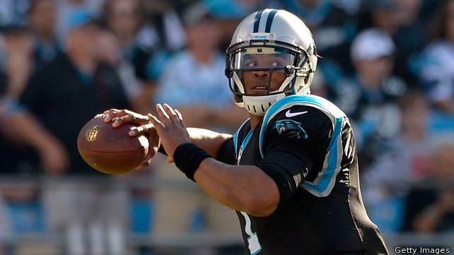 Cam Newton connected with Ted Ginn Jr twice for first half touchdowns