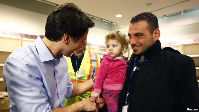 Syrian refugees headed to Canada on first planeload