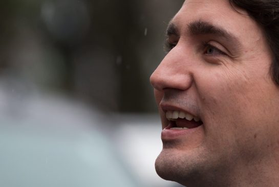 Prime Minister Justin Trudeau leaves after a visit to City Hall in Vancouver last Thursday. Trudeau had promised during the campaign to bring 25,000 Syrian refugees to Canada by the end of the year