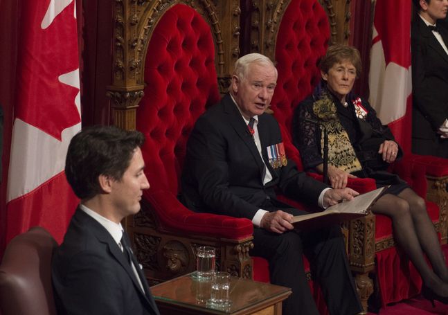 Prime Minister Justin Trudeau and Sharon Johnston listen as Governor General David Johnston delivers the speech from the throne in the Senate Chamber on Parliament Hill in Ottawa on Friday