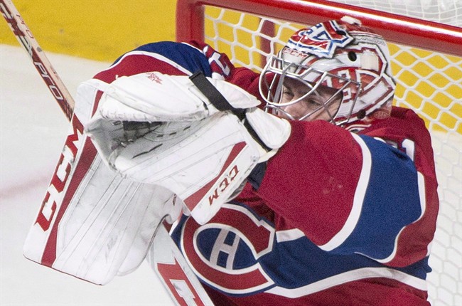 Montreal Canadiens goaltender Carey Price makes a save against the Toronto Maple Leafs during thrid period NHL hockey action in Montreal Saturday