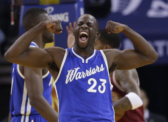 Draymond Green celebrates after scoring against the Cleveland Cavaliers during the first half of an NBA basketball game Friday Dec. 25 2015 in Oakland Calif