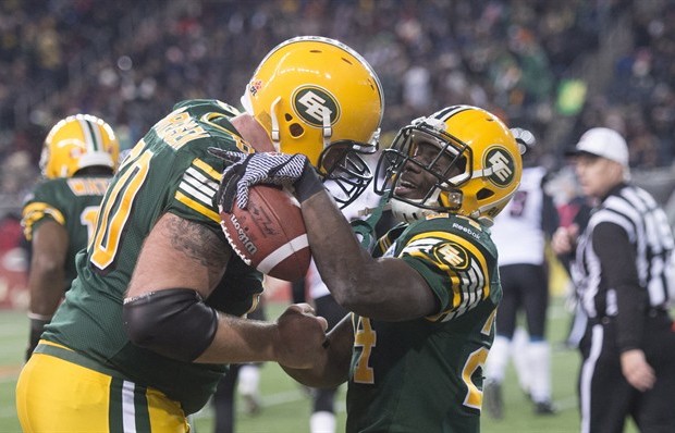 Edmonton Eskimos&#039 Akeem Shavers right celebrates his touchdown with teammate Justin Sorensen during the 103rd Grey Cup in Winnipeg Man. Sunday Nov. 29 2015. THE CANADIAN PRESS  Ryan Remiorz