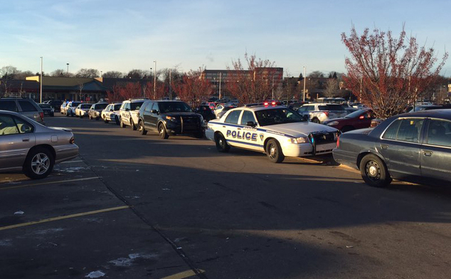 Madison authorities respond to reports of shots fired at the East Towne Mall in Madison Wis. Saturday Dec. 19 2015. (Sha