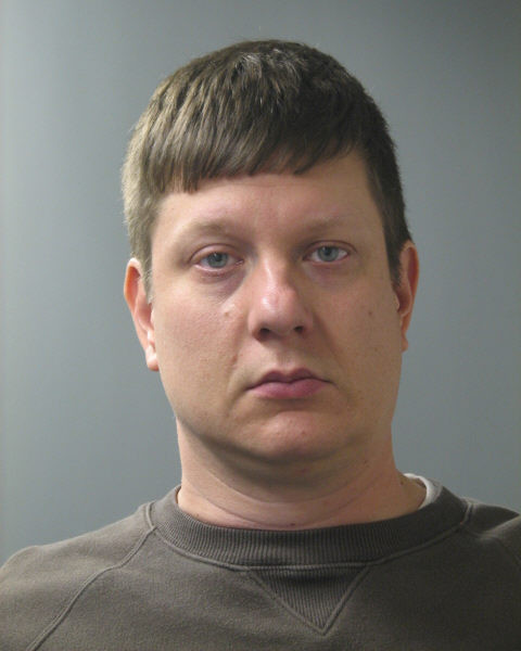 Chicago police officer Jason Van Dyke poses for a mugshot after he was was arrested for the shooting death of an African American teen Laquan Mc Donald in Chicago Illinois