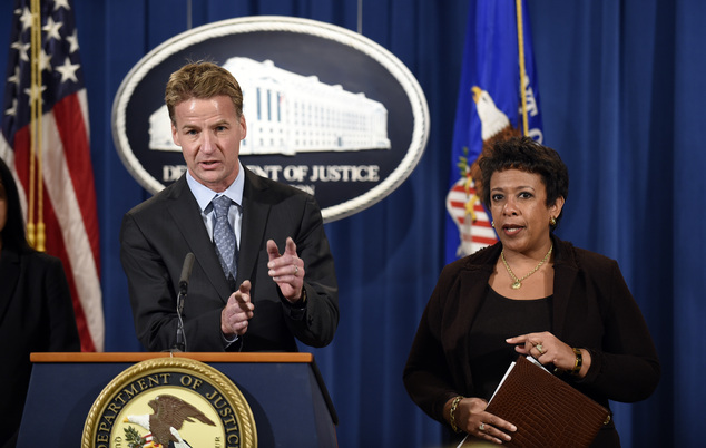 Attorney General Loretta Lynch right and U.S. Attorney in Chicago Zachary Fardon left speaks during a conference at the Justice Department in Washington