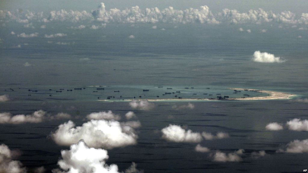 China accuses US of serious military provocation over B-52 flight above South China Sea island