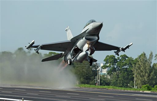 Taiwan Air Force F-16 fighter jet takes off from a closed section of highway during the annual Han Kuang military exercises in Chiayi central Taiwan. China on Wednesday strongly criticized an expected US arms sale