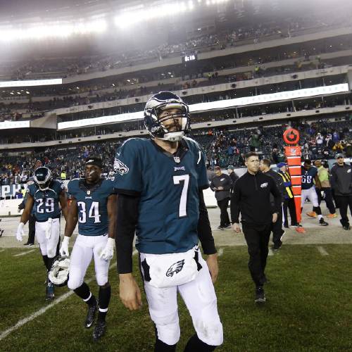 Sam Bradford walks onto the field after an NFL football game against the Washington Redskins Saturday Dec. 26 2015 in Philadelphia. Washington won 38-24