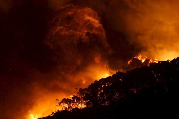 A bushfire burns at Wye River near Lorne south of Melbourne