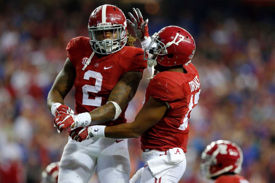 ATLANTA GA- DECEMBER 5 Running back Derrick Henry #2 of the Alabama Crimson Tide celebrates with running back Kenyan Drake #17 of the Alabama Crimson Tides after scoring a second quarter touchdown against the Florida Gators during the SEC Championship