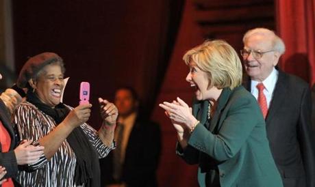 Democratic presidential candidate Hillary Clinton with famed investor Warren Buffett greeted supporters after speaking at a Town Hall rally in Omaha Wednesday